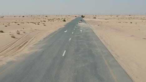 desert road with a car