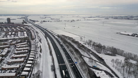 aerial view snow landscape and highway a1 at amersfoort, the netherlands