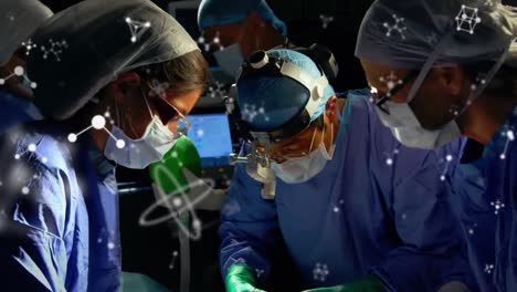 Animation-of-molecules-over-group-of-diverse-male-and-female-surgeons-at-surgery-room