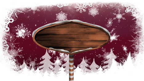 nieve cayendo y cartel de madera