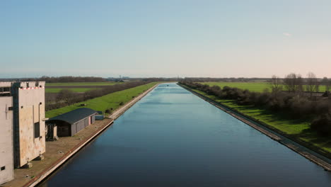 Aerial:-The-locks-of-the-Canal-through-Walcheren,-near-the-historical-town-Veere