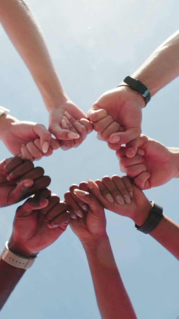 Diverse Hands Forming a Circle of Unity and Teamwork