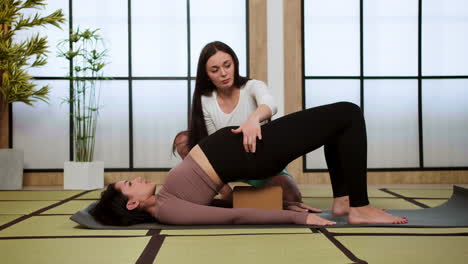 women doing yoga indoors