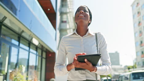 Tablet,-walking-and-a-business-black-woman