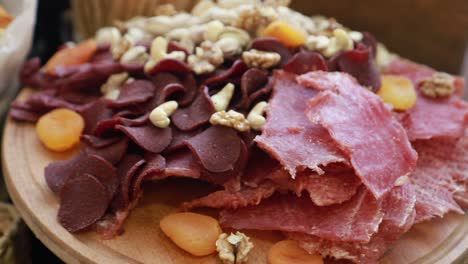 Cutting Sausage and Cured Meat on a Celebratory Table Cutting Sausage and Cured Meat on a Celebratory Table