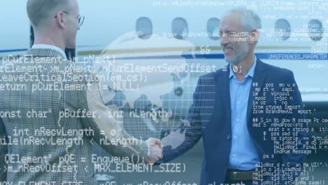 Businessmen-shaking-hands-with-rotating-globe-in-foreground