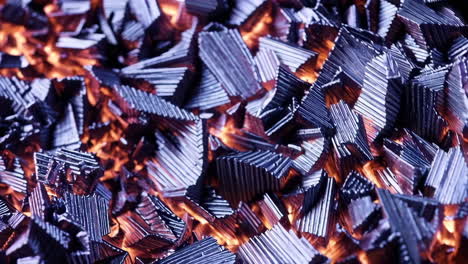 abstract metallic fragments with fiery glow