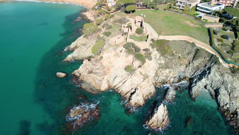 high above, la fosca's coastline invites guests to embark on a journey of discovery, with the castle serving as a gateway to a world of luxury, history, and natural beauty along the costa brava