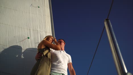 Couple on a Sailboat at Sunset