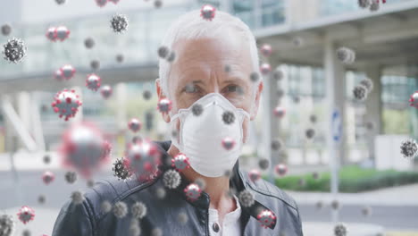 animation of covid 19 cells over caucasian man wearing face mask