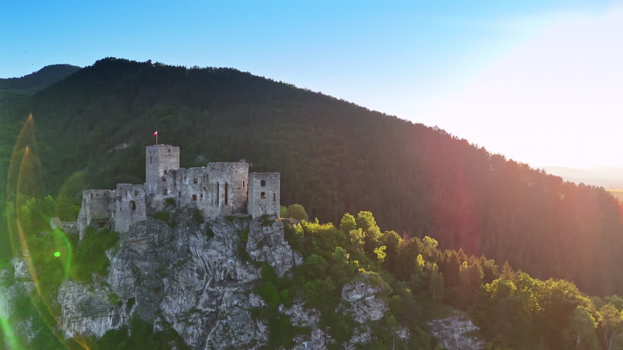 Strecno Castle on the mountain top in the countryside of Slovakia. Famous tourist landmark from drone footage