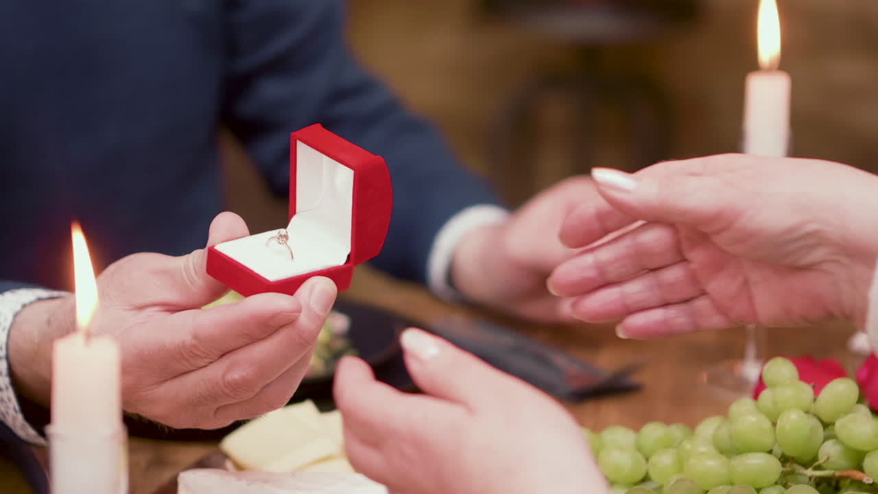 Romantic Marriage Proposal at Candlelight Dinner