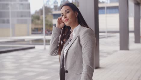 grinning optimistic business woman