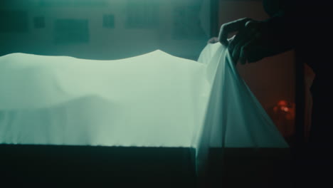 mysterious scene with covered body