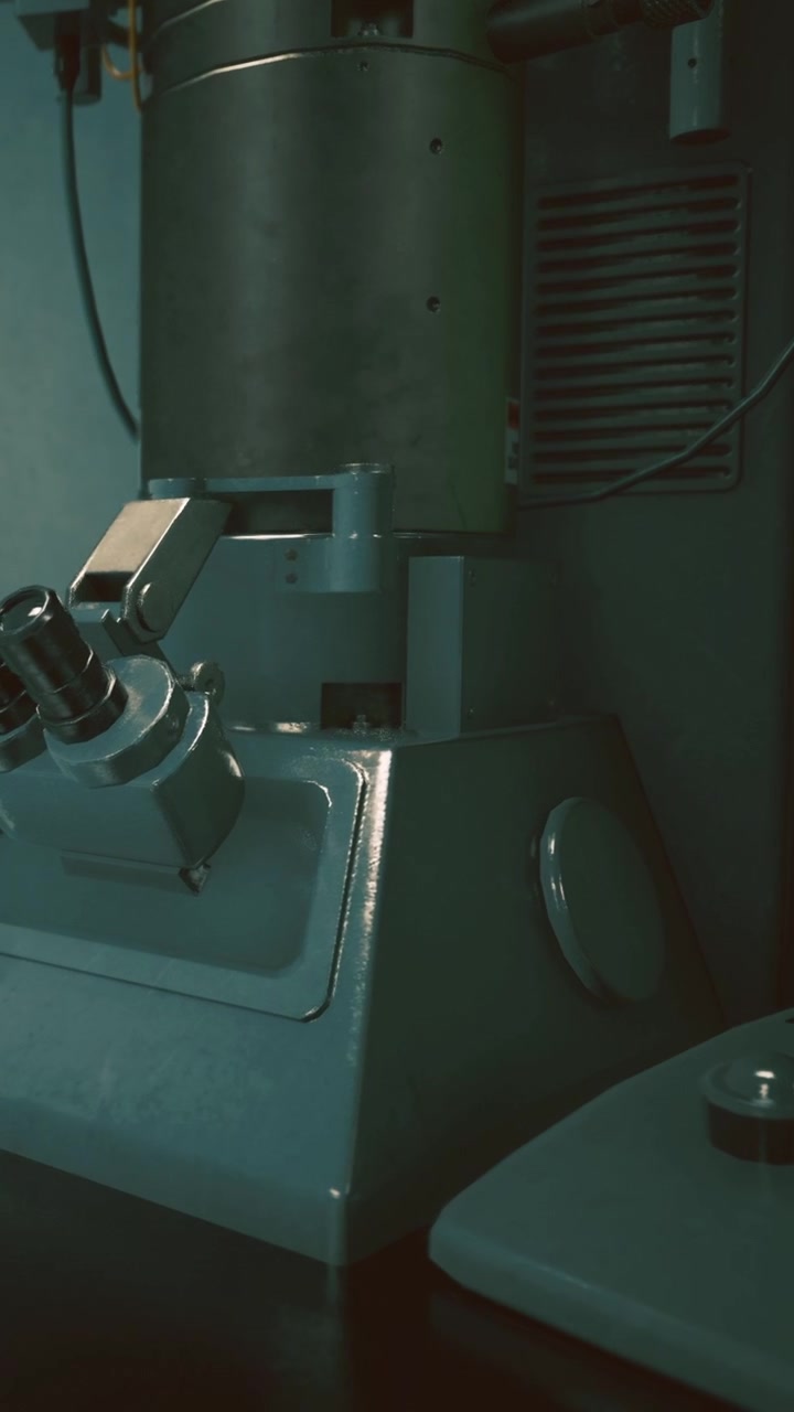 Close view of a microscope in a laboratory during the evening hours