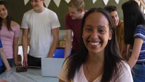portrait of teenage girl in a school classroom