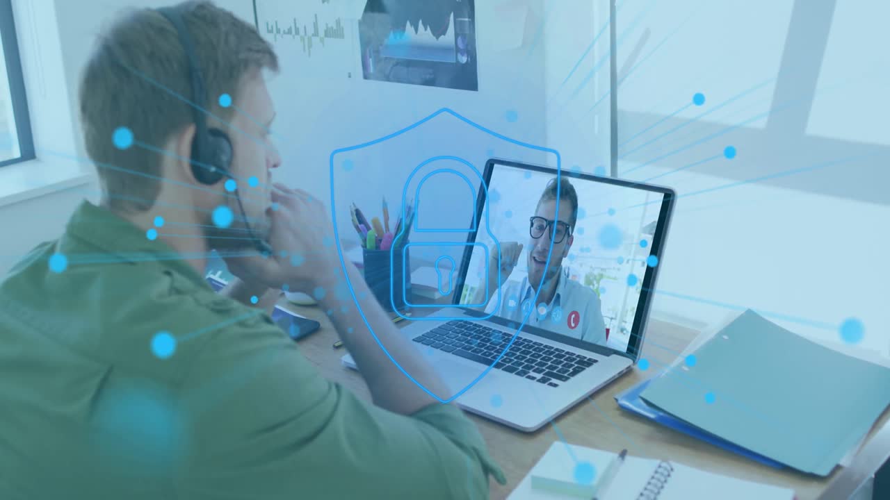 Animation of online security padlock over caucasian man using phone headset and laptop