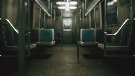 inside of the old non-modernized subway car in usa