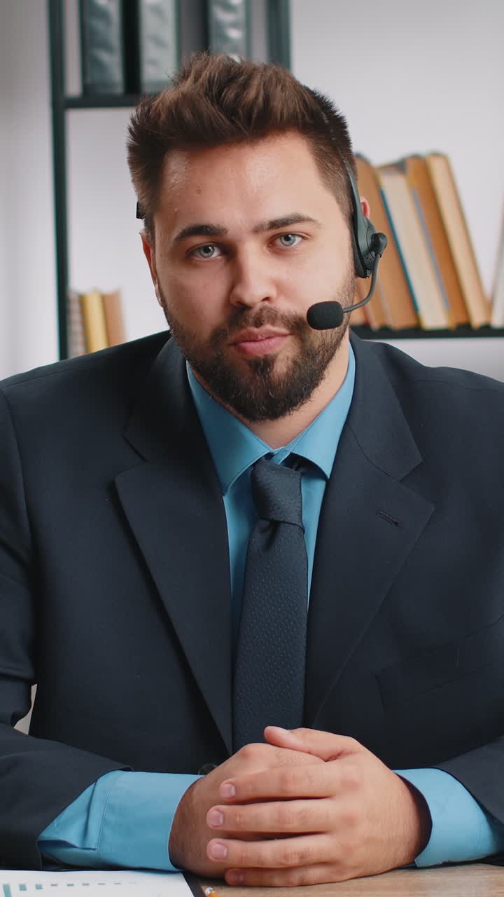 Businessman working on laptop wearing headset call center support service operator office helpline