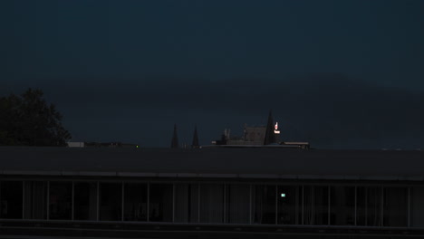 smoke from an industrial fire blows over antwerp, belgium