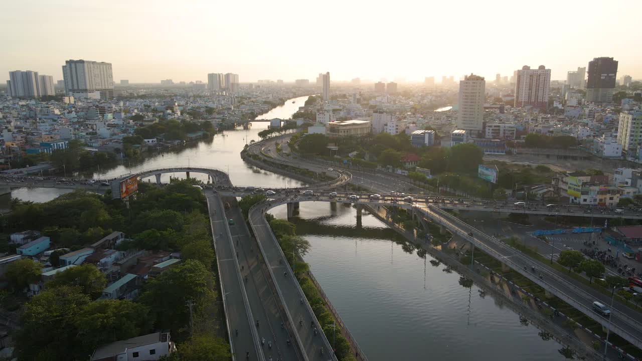 Motorcycles run on the bridge in the sunset afternoon Vietnam