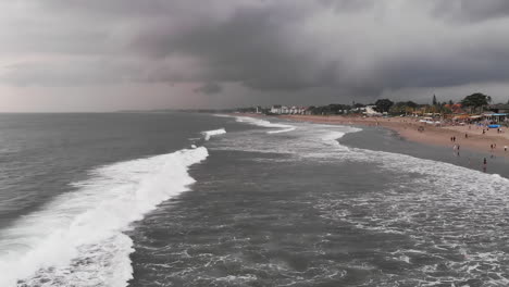 drone capturing bad weather at the shore of a tropical island