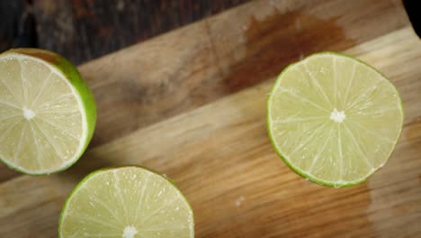 halves of a ripe lime on the cutting board.