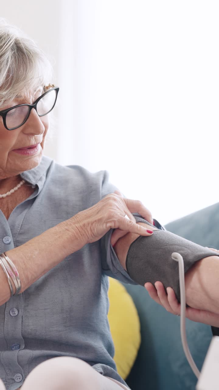 Senior Woman Having Blood Pressure Checked