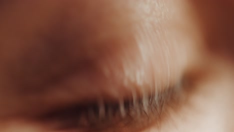 human eyes blinking. extreme close-up shot