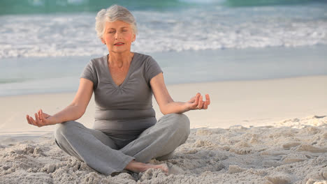 elderly woman doing yoga