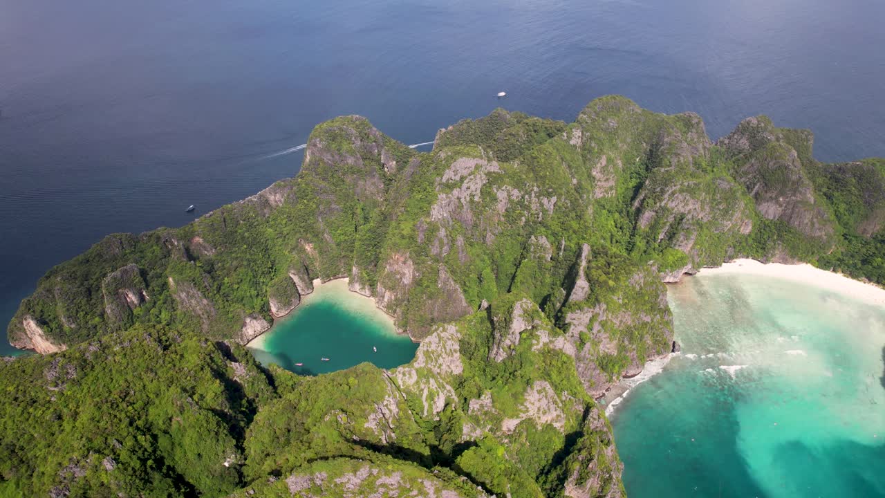 Aerial top-down drone view of Phi Phi Leh, Pileh Lagoon, Krabi province, Thailand. Amazing tropical island with turquoise water and white beach, famous travel destination, clear turquoise water.