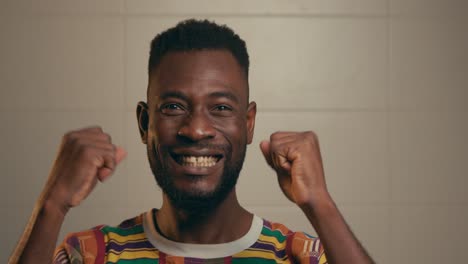 Bearded-Face-Afro-American-Man-Celebrating.-Slow-Motion