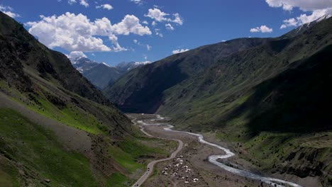 aerial shots of clouds passing over the mountains of kpk, kunhar river and the naran kaghan road to babusar pass