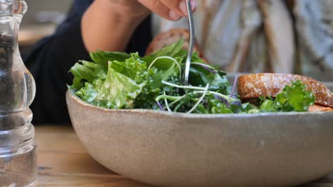 person eating a healthy salad