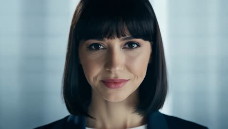 confident businesswoman looking at camera in a professional portrait