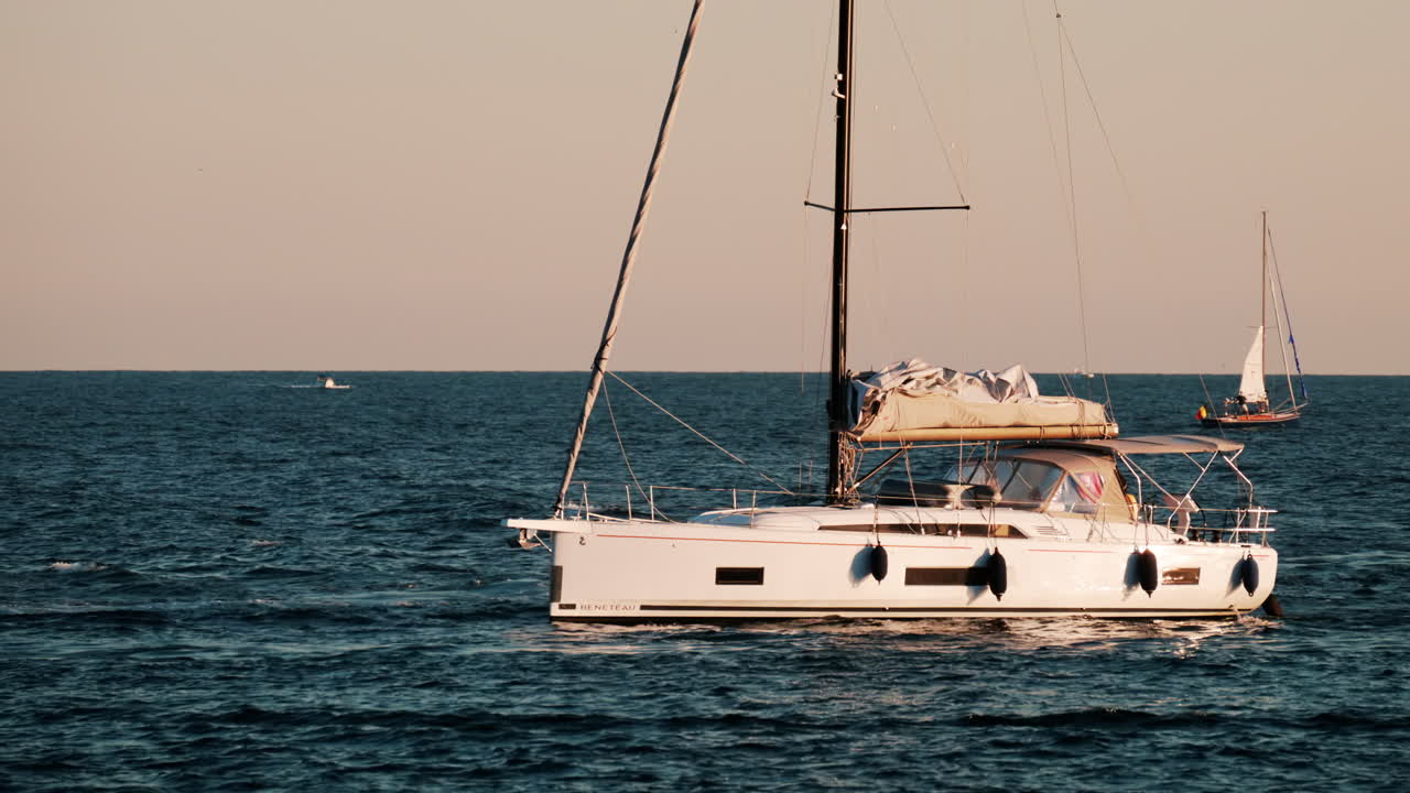 White boats moving on the sea in Golfe-Juan, France