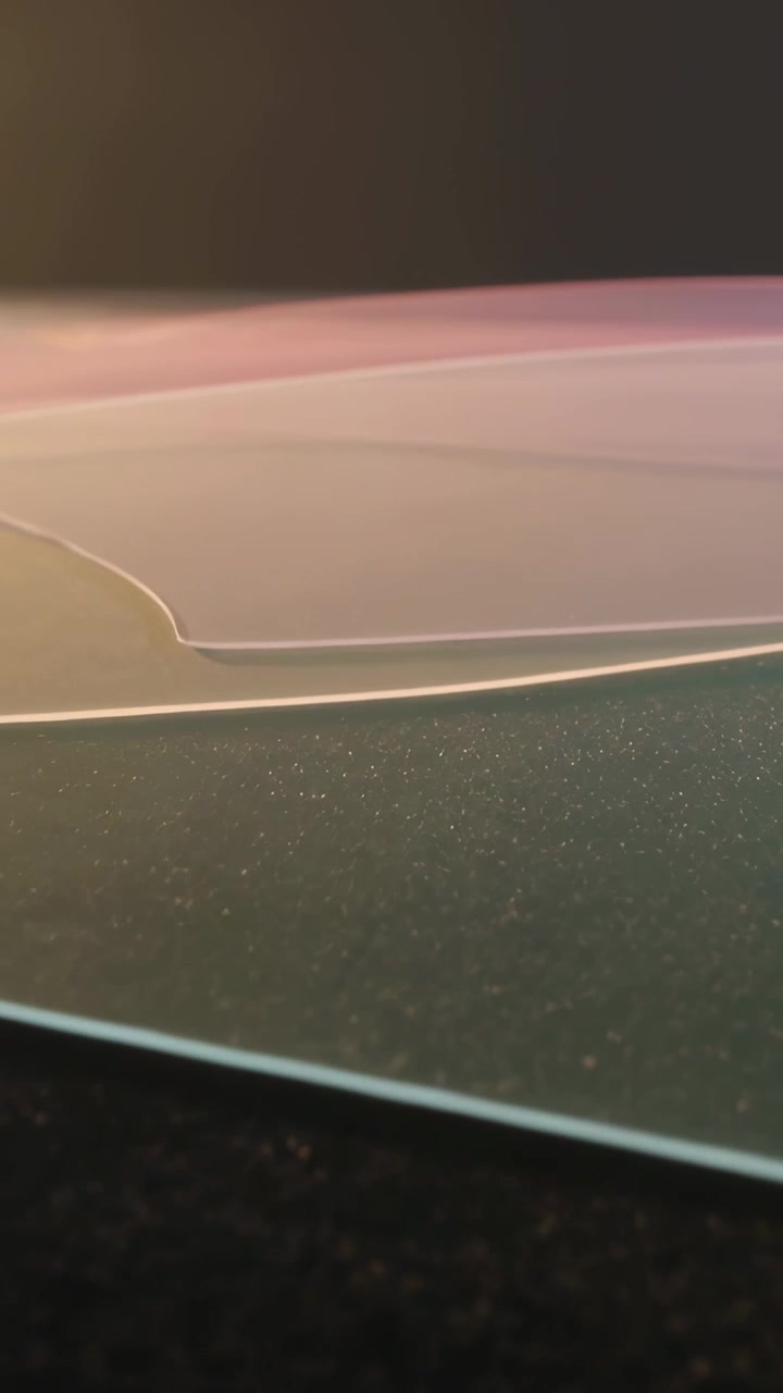 Vertical video: Tilting camera showing stacked frosted panels on tabletop to reveal pastel edges