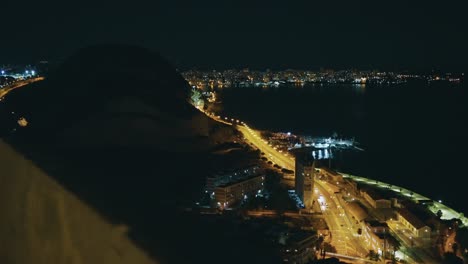 Alicante's-coast-at-night-seen-from-the-top-of-the-Castle-Santa-Barbara,-spain