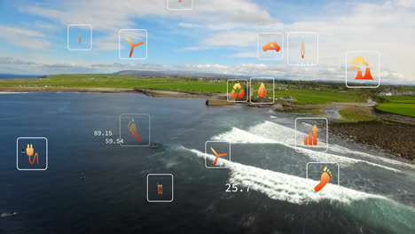 overlaying animation of wind energy data and icons on coastal landscape with waves