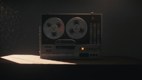 a vintage tape recorder with spinning spools