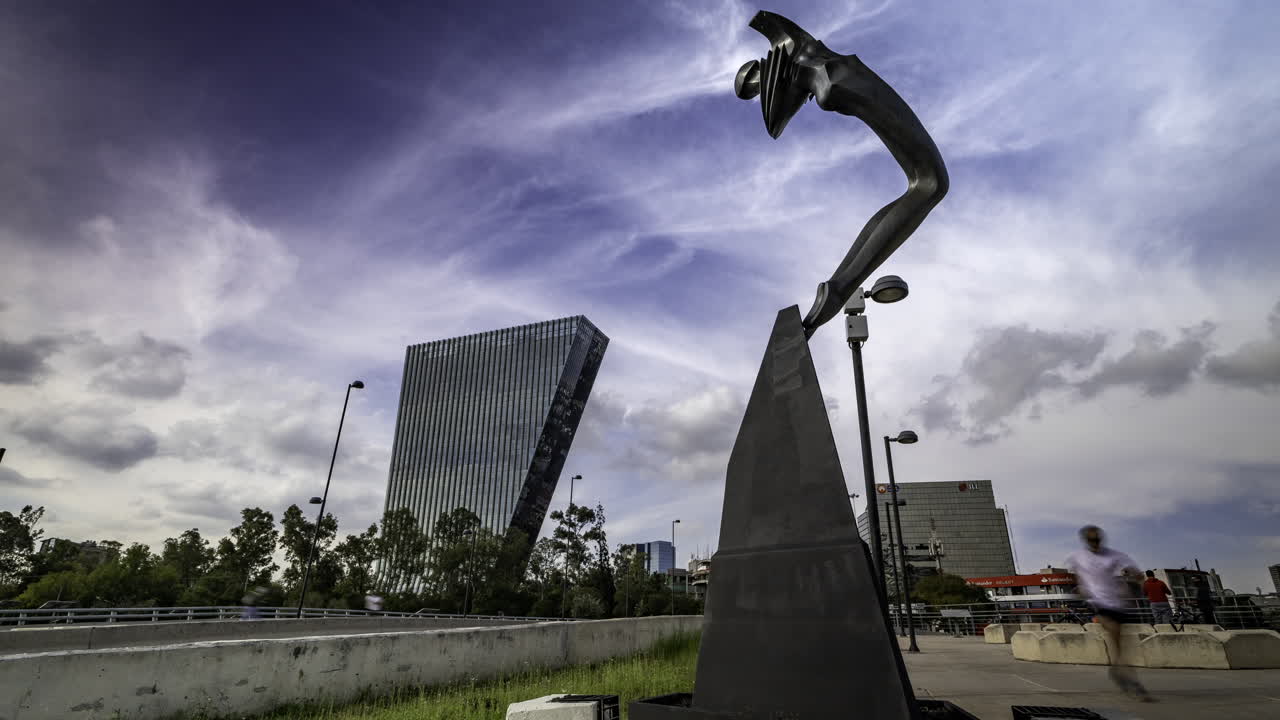 Shot of the sculpture "Viento" located on Paseo de la Reforma Avenue, the Virreyes building is to the left of the shot