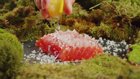 preparing a lemon-seared salmon dish