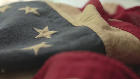 detail of american flag with 13 stars of the revolution