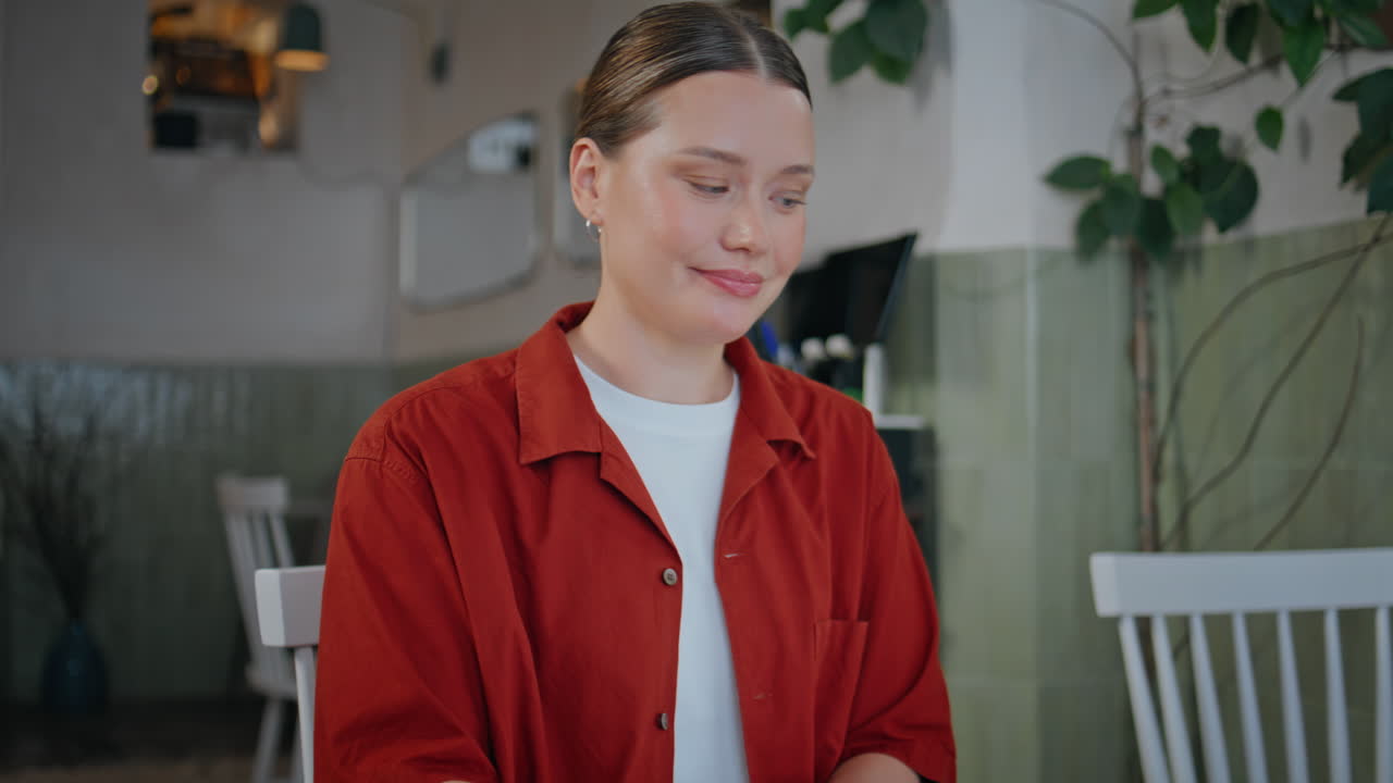 Restaurant owner working papers sitting table alone closeup. Thoughtful woman