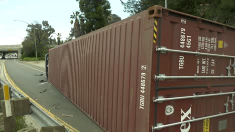 Overturned-large-semi-truck-on-freeway