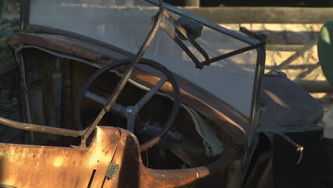 old abandoned rusty car in the desert in solitaire, namibia. locked off