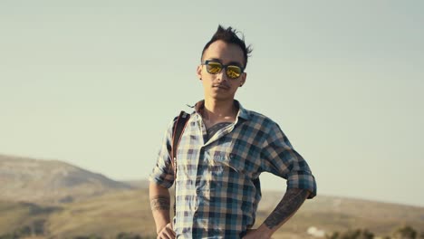 Young-Nepali-man-with-style-looks-directly-to-camera