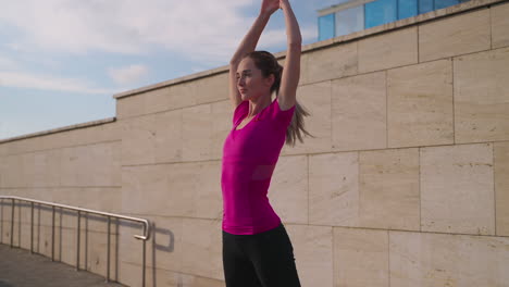 woman stretching outdoors