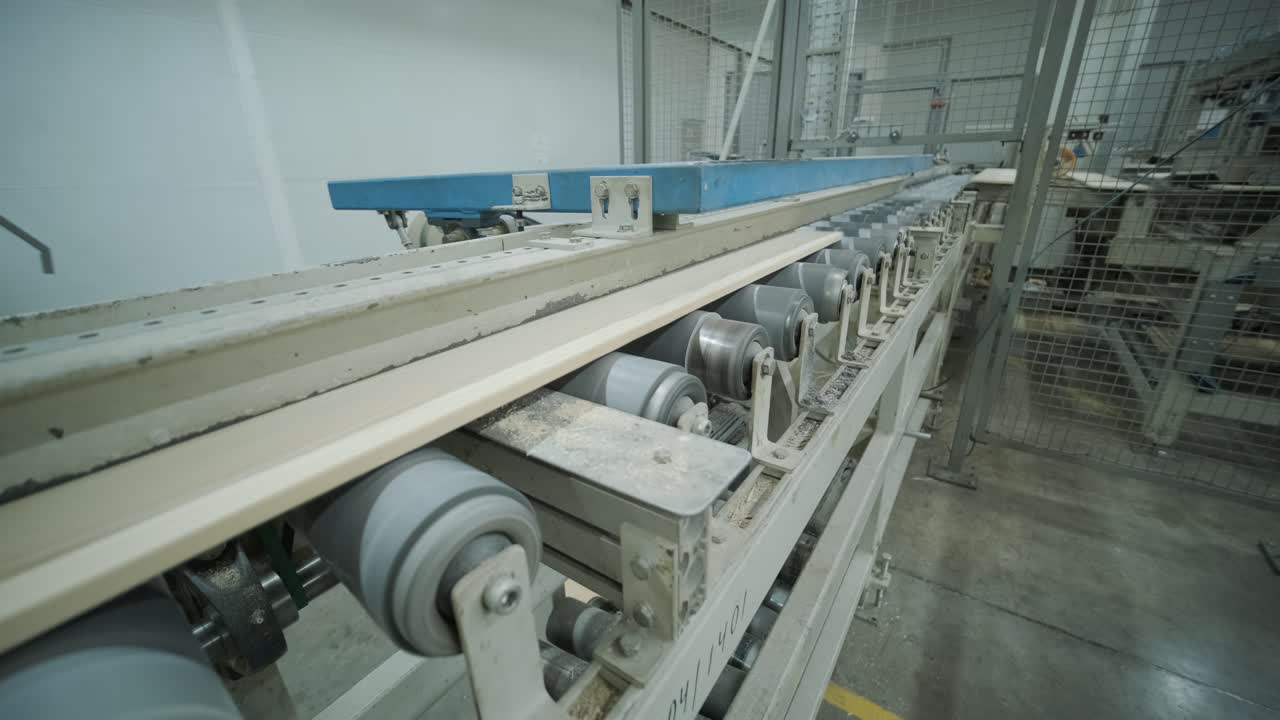 Wooden Plank Moving on Conveyor Belt in Industrial Factory