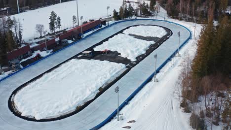 Artificially-Frozen-Skating-Track-On-Snowy-Landscape-In-Zakopane,-Poland-During-Winter